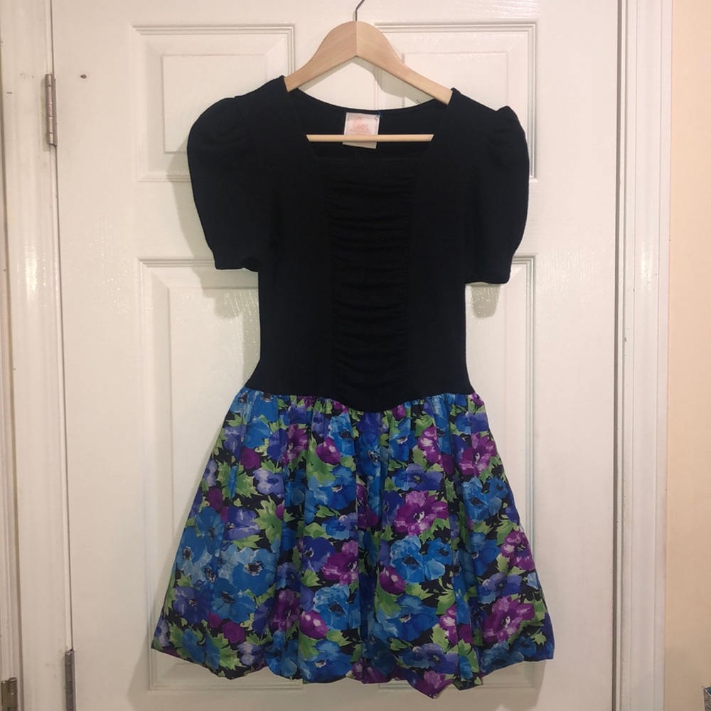 black ruffled, floral girl’s dress